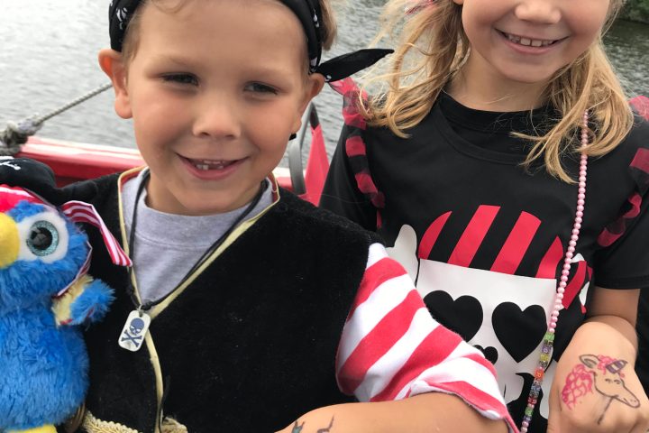 a little girl posing for a picture