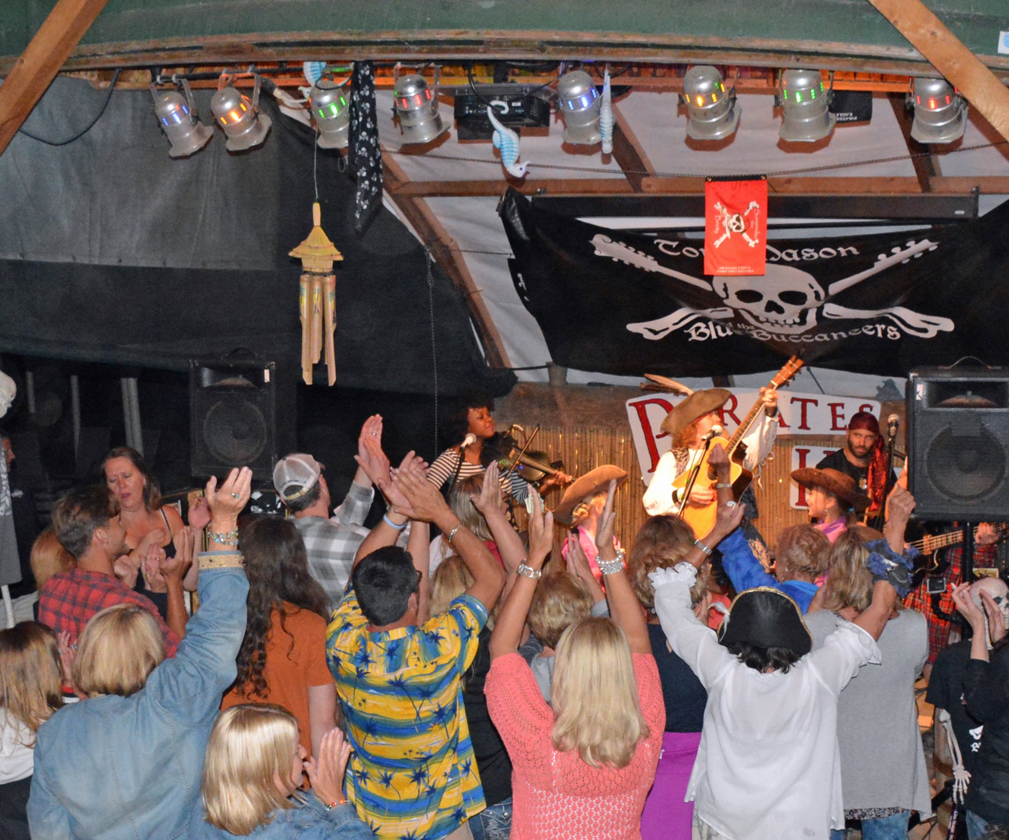 a group of people standing in front of a crowd