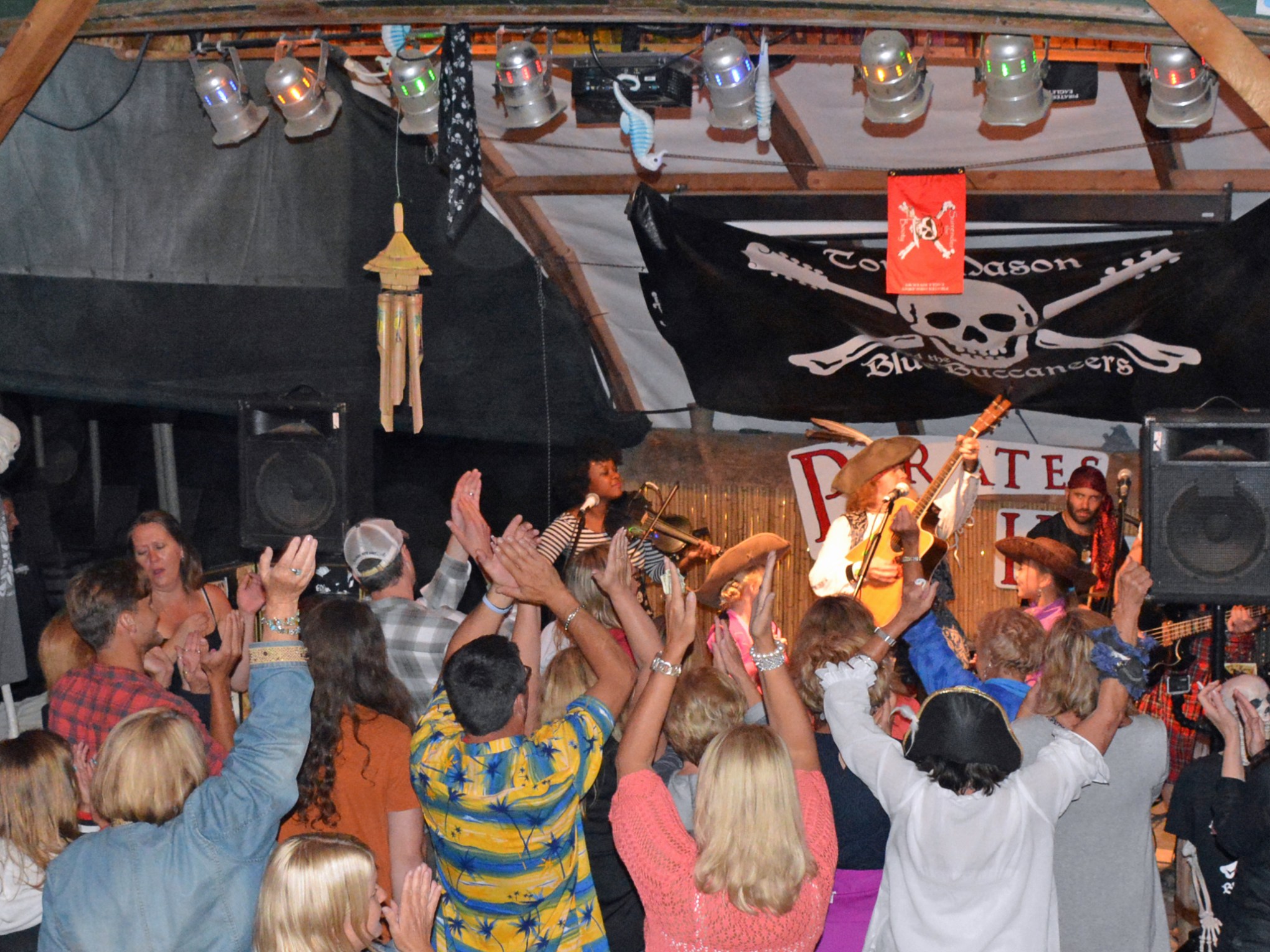 a group of people standing in front of a crowd