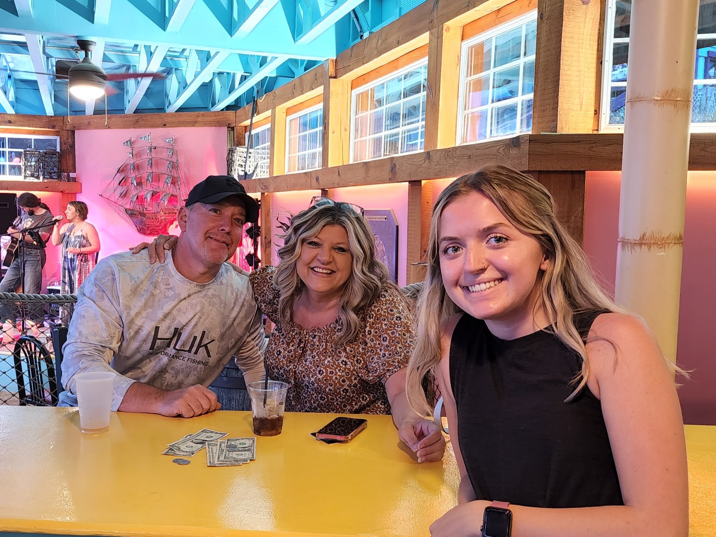a group of people standing in front of a building