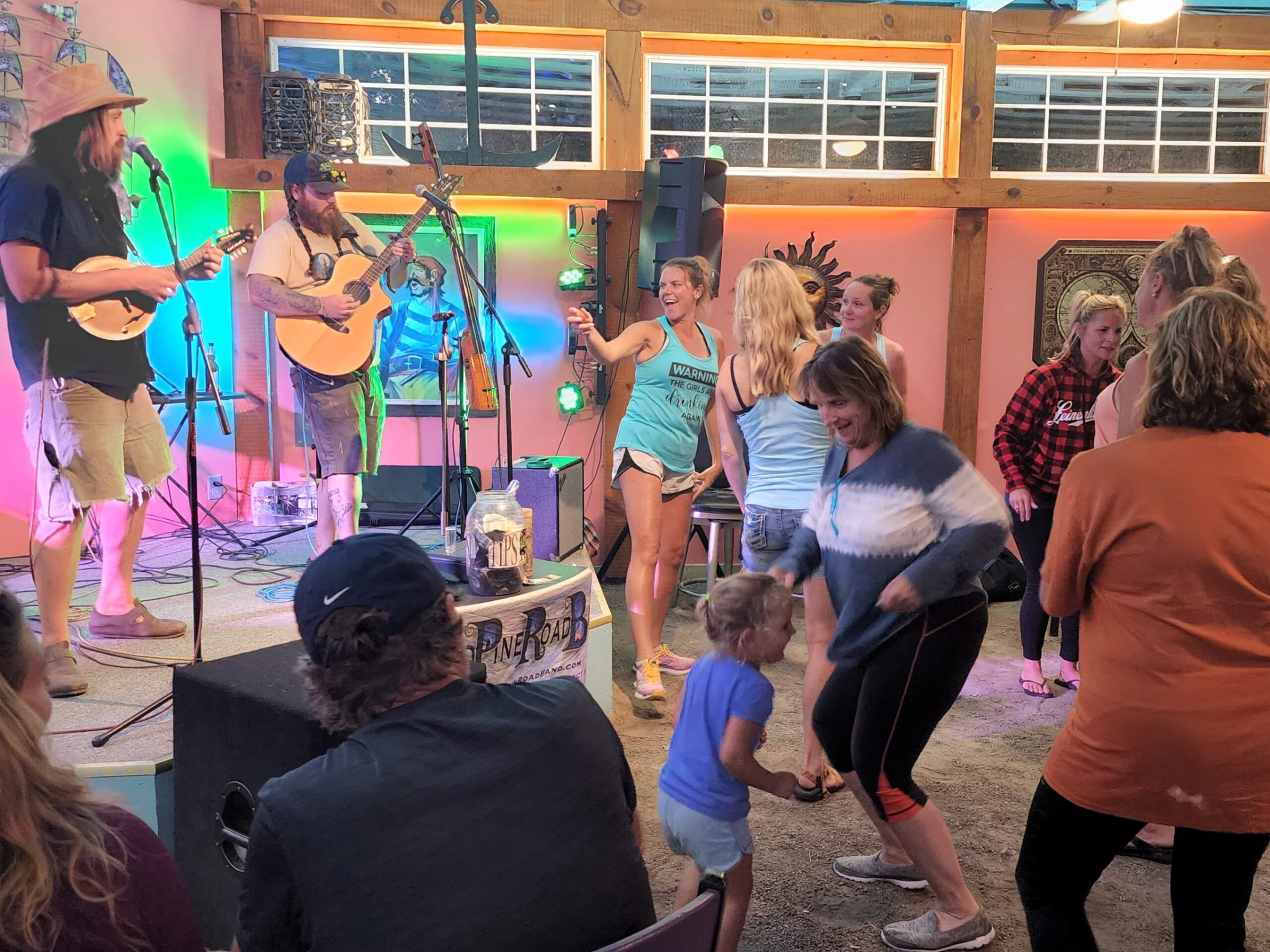 a group of people standing in front of a crowd